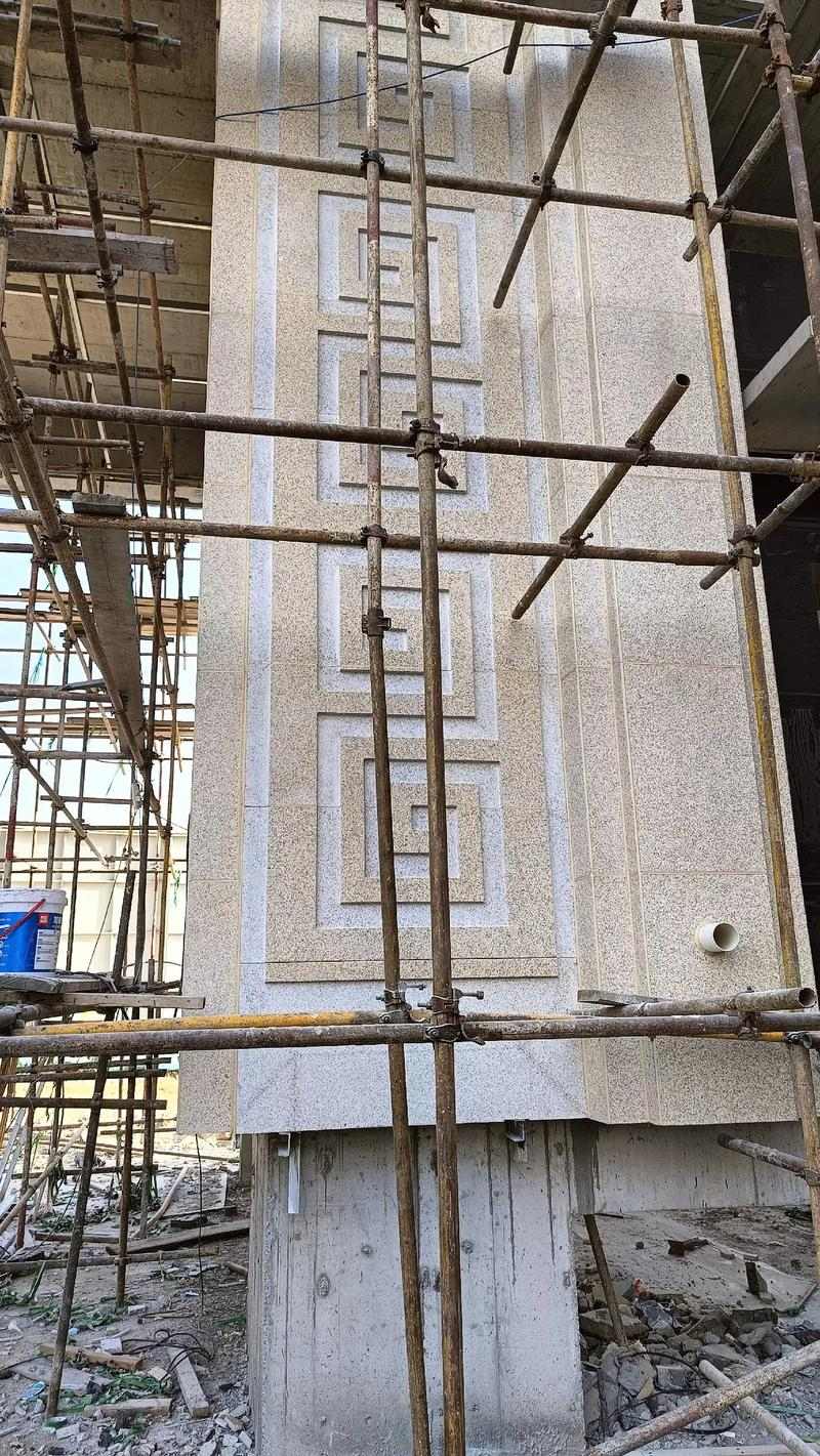 绥化 黄金麻花岗岩别墅外墙干挂回纹造型效果