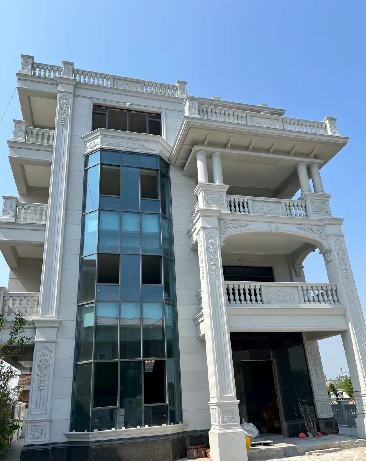 绥化 白麻花岗岩别墅外墙干挂效果展示