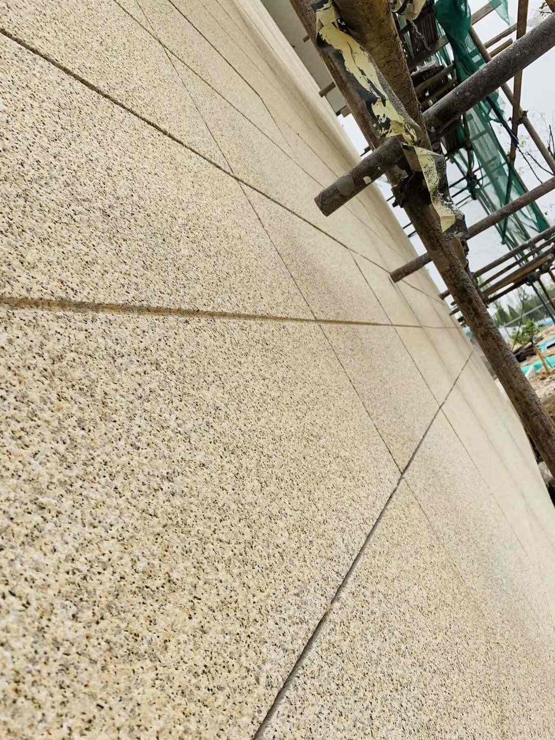 绥化 黄金麻花岗岩荔枝面外墙干挂石材效果示例